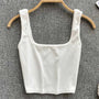 Rückenfreies, kurzes Tanktop in Uni-Farbe – Zayra