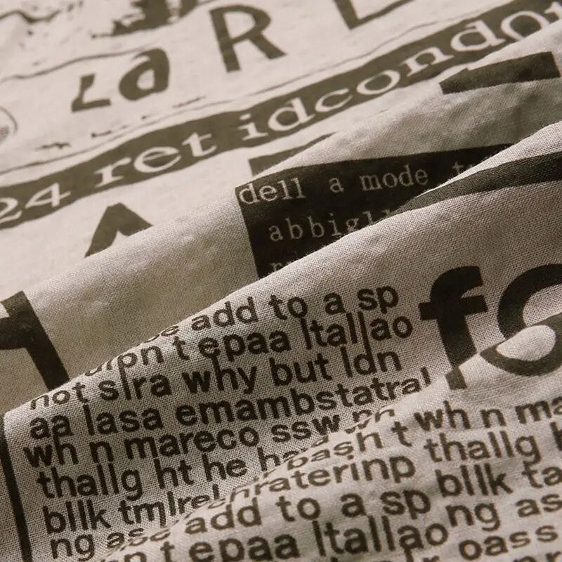 Hemd mit Zeitungsprint und Knopfleiste - Milo
