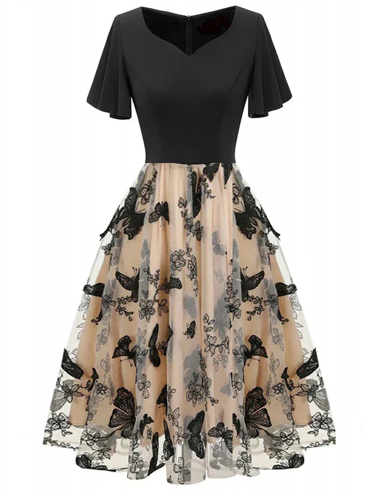 Stylish midi dress made of mesh with embroidery and flounce sleeves – Maila