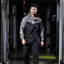 Leichter Unisex-Trainingsanzug mit Reißverschluss und Kapuze - Remo