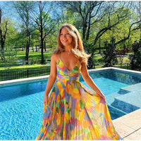 Printed Summer Dress with Deep Neckline and Bow Detail – Vivienne