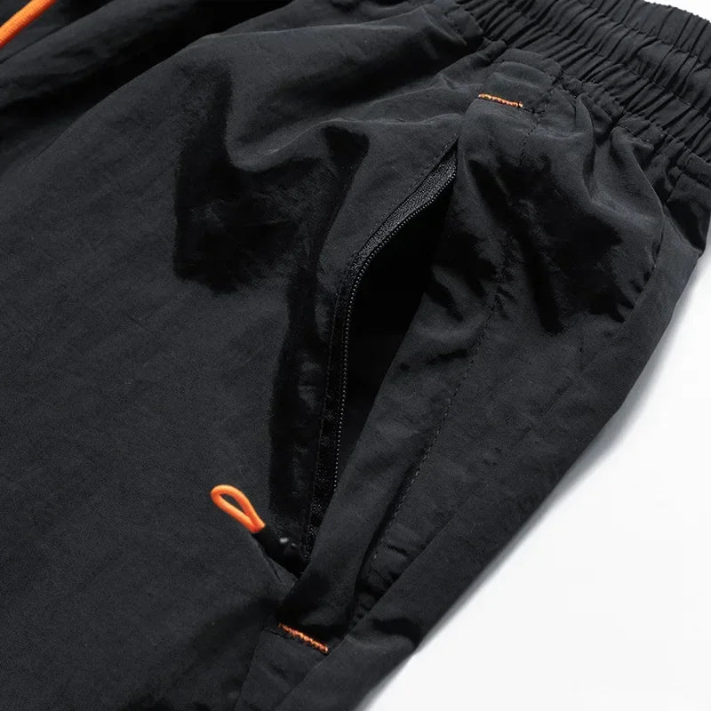 Heren Hardloopshorts met Mesh Binnenbroekje en Ritszakken – Nikoas