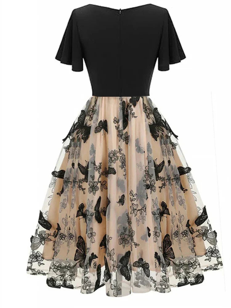 Stylish midi dress made of mesh with embroidery and flounce sleeves – Maila
