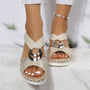 Keilabsatz-Sandalen mit Schlangenprint – Viperra