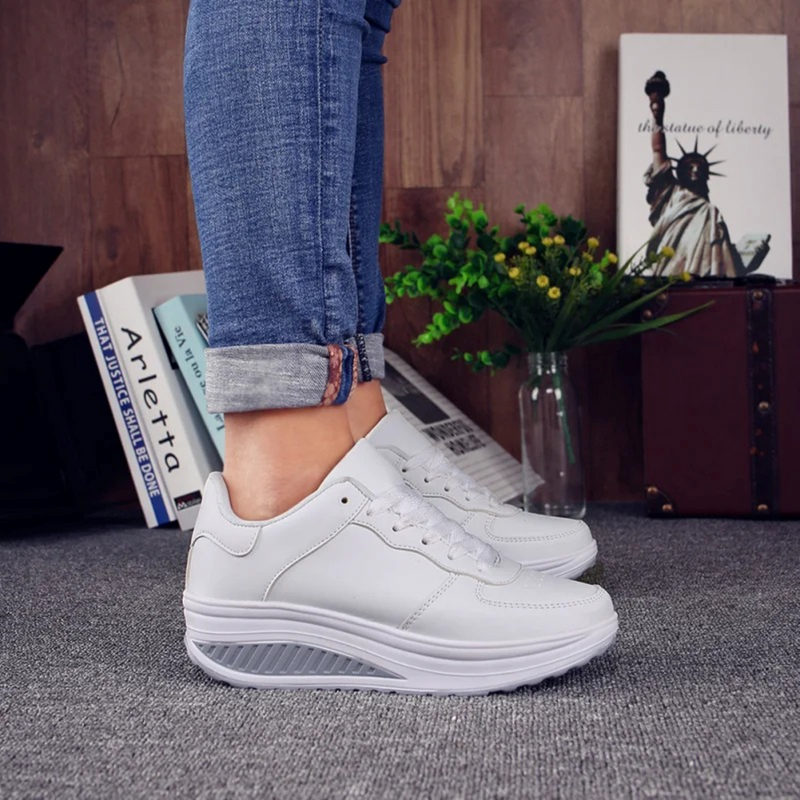Orthopädische Damensneaker aus schwarzem Leder - FlexiStep