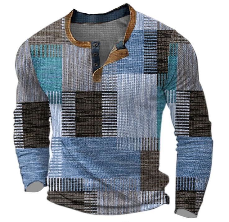 Voorkant van dezelfde trui in blauwe tinten met bruine en turquoise blokken en een bruine kraagrand met knopen. 3