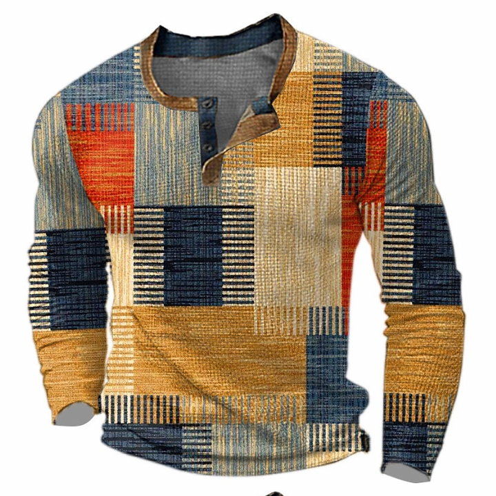 Voorkant van de trui met knoopsluiting in oranje, geel, blauw en beige blokken met strepen en een bruine kraagrand. 1