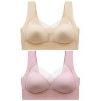 Twee bh's boven elkaar op witte achtergrond: de bovenste beige, de onderste roze, beide met mesh-inzetstuk. 20