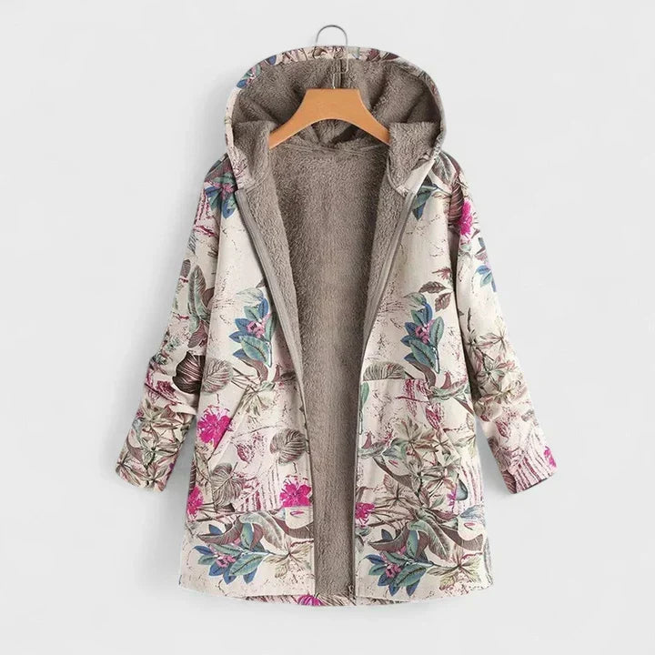 Opengeritste parka op hanger met roze bloemen en blauwgroene bladeren op lichte stof, fleece voering 2