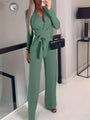 Weit ausgestellte Jumpsuit mit Gürtel und V-Ausschnitt - Elise