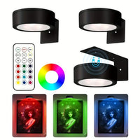 Drie zwarte lampen met afstandsbediening, kleurenwiel en een schilderij in rood, groen en blauw licht 7