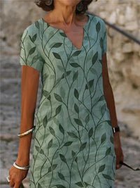 Bezauberndes Kleid mit magischem Design in Smaragdgrün - GreenAura