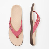 Roze teensandalen met gesp, bovenaanzicht van de beige voetbedding en zijaanzicht van de zool 6