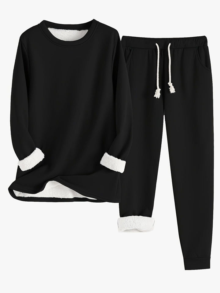 Tweedelige set in zwart: trui met ronde hals en broek met trekkoord, witte fleecevoering aan mouwen en zoom 4