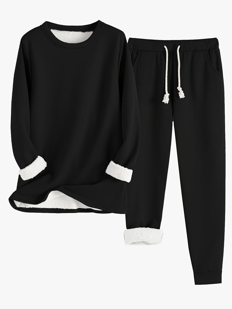 Tweedelige set in zwart: trui met ronde hals en broek met trekkoord, witte fleecevoering aan mouwen en zoom 4