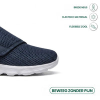 Detail van de brede neus van de donkerblauwe schoen met pictogrammen voor elastisch materiaal en flexibele zool. 5