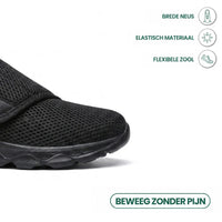Detail van de brede neus van de zwarte schoen met pictogrammen voor elastisch materiaal en flexibele zool. 14