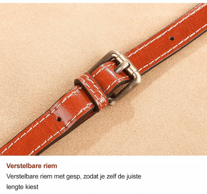 Close-up van de verstelbare leren band met gespsluiting en stiksels in roodbruin leer 12