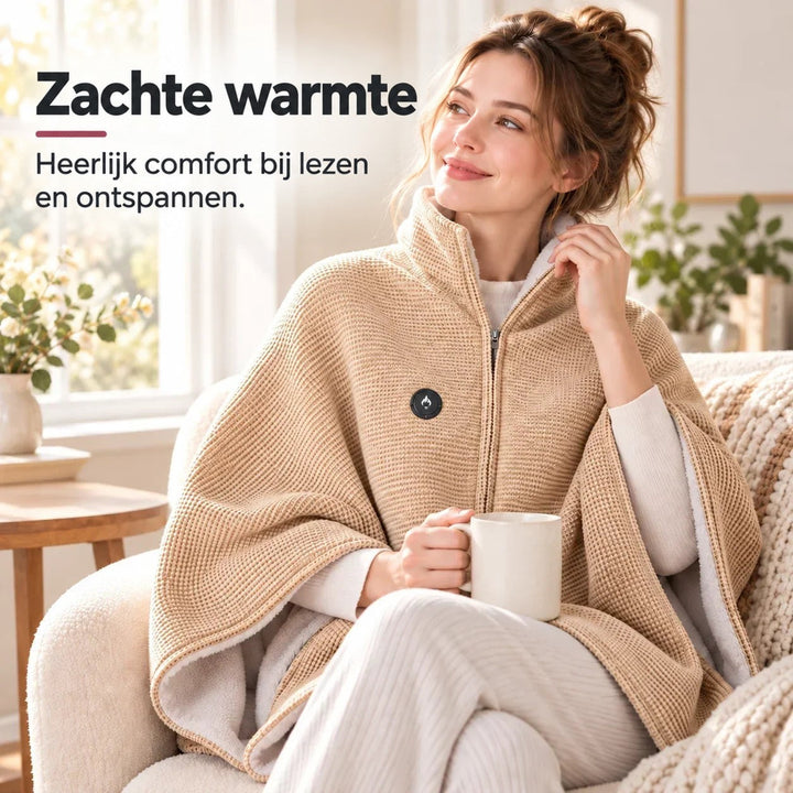 Vrouw op een fauteuil in de beige deken met opstaande kraag, een mok in haar hand 6