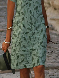 Bezauberndes Kleid mit magischem Design in Smaragdgrün - GreenAura