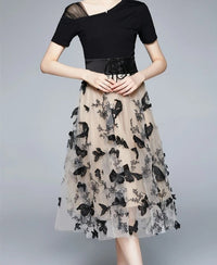 Stylish midi dress made of mesh with embroidery and flounce sleeves – Maila