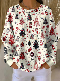 Witte wafeltrui met knoopjes en kerstprint met rode en zwarte kerstbomen, zuurstokken en sneeuwvlokken. 16