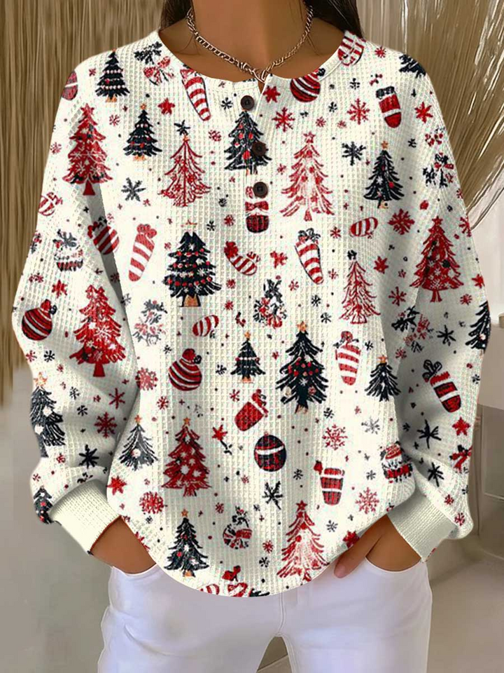 Witte wafeltrui met knoopjes en kerstprint met rode en zwarte kerstbomen, zuurstokken en sneeuwvlokken. 16