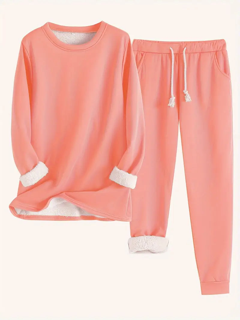 Tweedelige set in zalmroze: trui met ronde hals en broek met elastische taille, witte fleecevoering bij mouwen en zoom 8