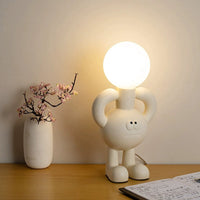 Verspielte Tischlampe mit Glaskugel - Glombra