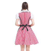 Rugzijde van de rood-wit geruite dirndl met donkergroene strik en witte pofmouwen, model gezien van achteren. 4