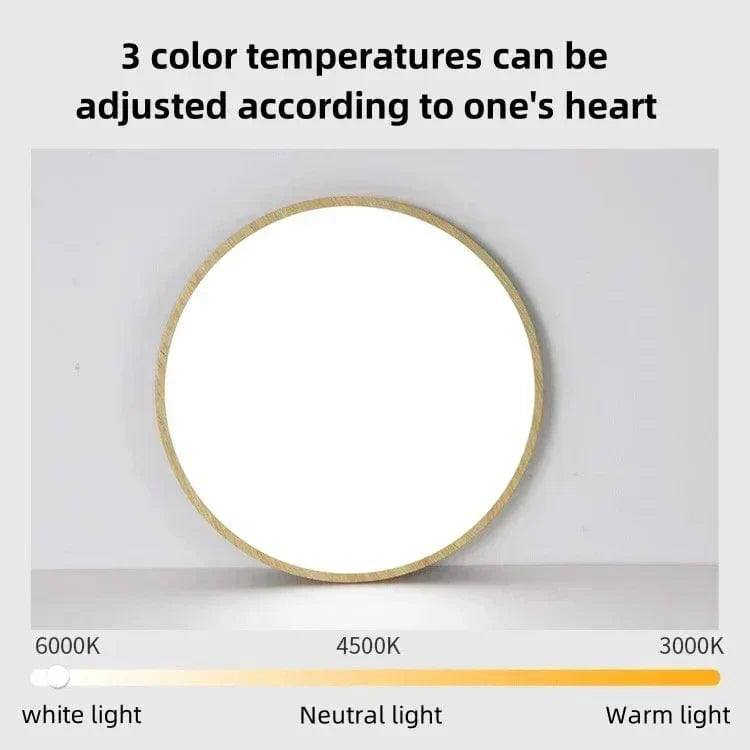 Ronde lamp met lichte houtrand die fel wit licht geeft, met schaal van drie instelbare kleurtemperaturen eronder. 18