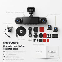 Flatlay van de complete set: hoofdunit, achtercamera, twee zijcamera's, kabels, bevestigingsmateriaal en een handleiding op een witte ondergrond. 6