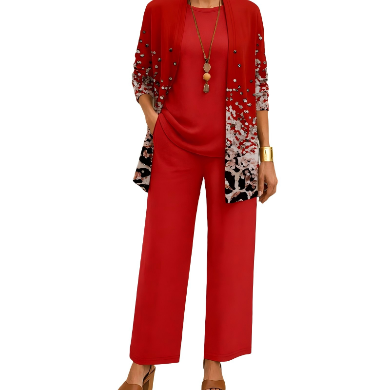 Set in rood met cardigan met stippenprint en luipaardmotief onderaan, effen shirt en wijde broek. 5