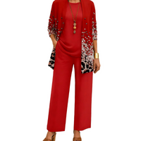Set in rood met cardigan met stippenprint en luipaardmotief onderaan, effen shirt en wijde broek. 5