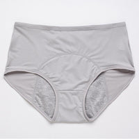 Lichtgrijze slip met hoge taille van voren, met gaatjesstof en een grijze voering in het kruis. 15