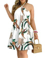 Rückenfreie Sommerkleid mit tropischem Print und Neckholder - InselTraum