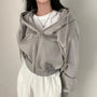 Kurze Damenweste mit Kapuze und oversized Passform – Rinette