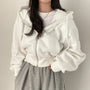 Kurze Damenweste mit Kapuze und oversized Passform – Rinette