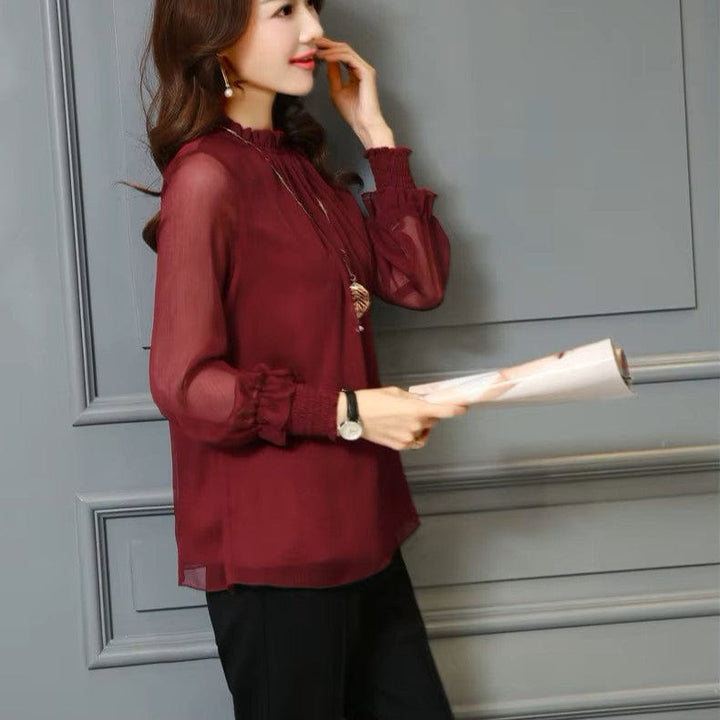 Stylish women's chiffon blouse with ruffles and transparent sleeves – Elina