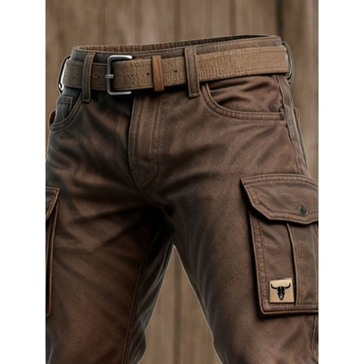 Close-up van de taille met riem, voorzak en opgestikte zijzak met klep en klein leren label 5