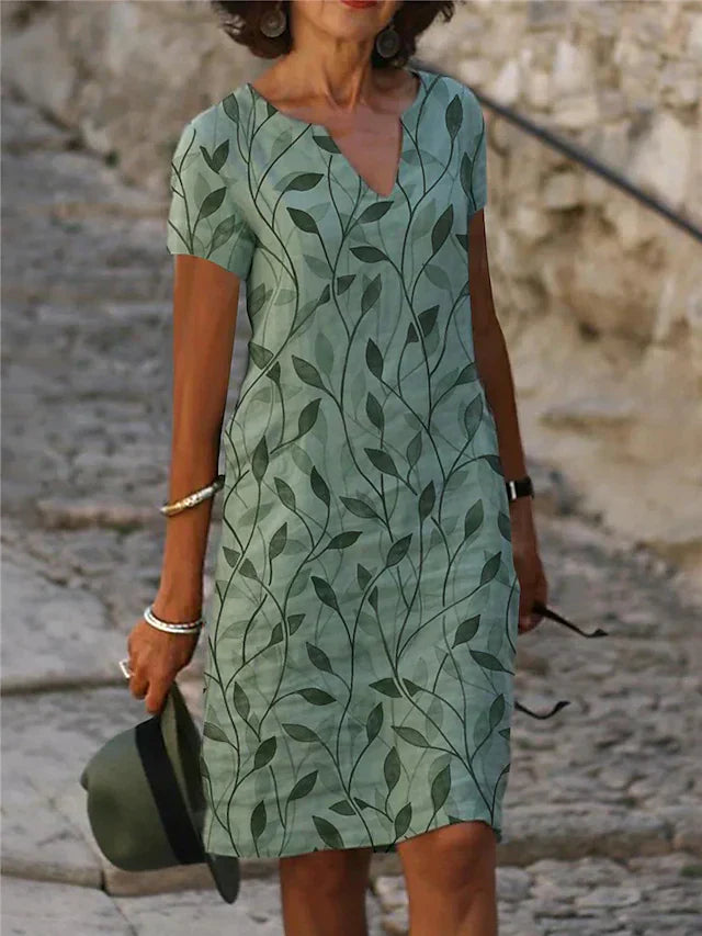 Bezauberndes Kleid mit magischem Design in Smaragdgrün - GreenAura