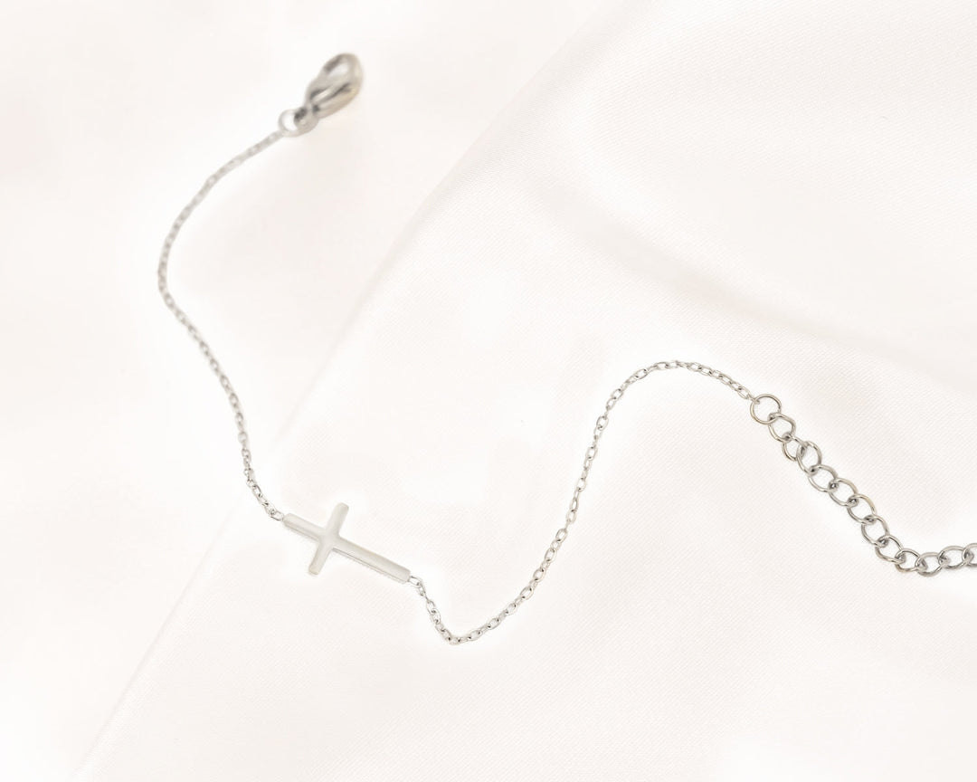 Gouden en zilveren kruis armband