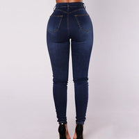 Double-breasted skinny jeans met hoge taille