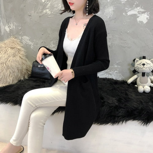 Long knitted cardigan with pockets