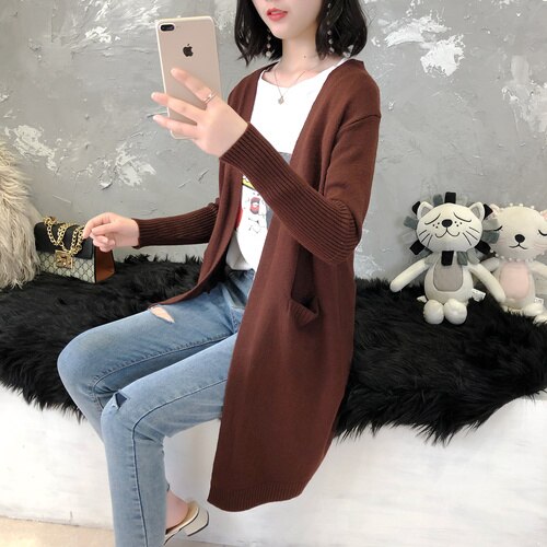 Long knitted cardigan with pockets