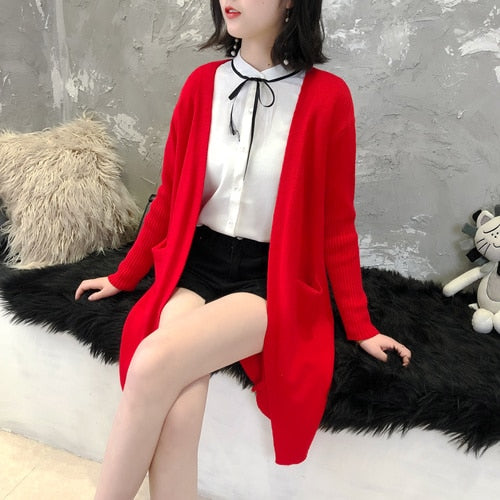 Long knitted cardigan with pockets