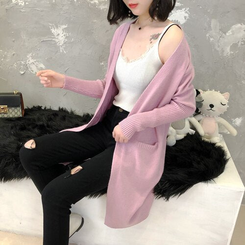 Long knitted cardigan with pockets