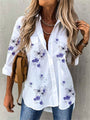 Schöne Bluse mit Schmetterlingsmuster