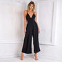 Jumpsuit mit Rückenausschnitt und festen Trägern | Weite Bein Sommer Playsuit